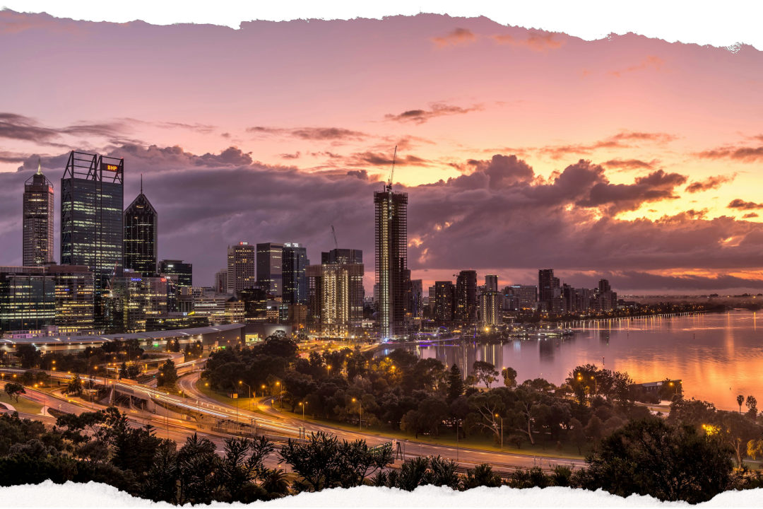 The Perth skyline along the Swan River at dusk