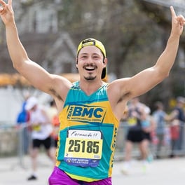 Marathon runner celebrating 