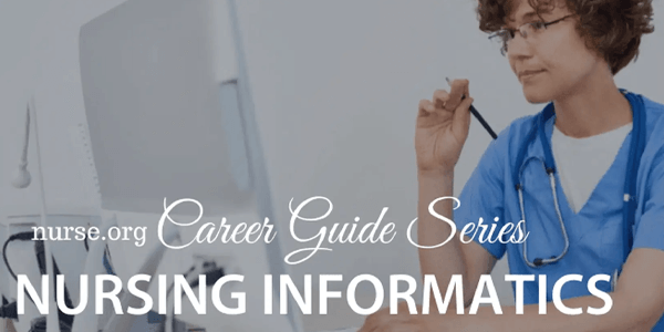 Nurse on computer taking notes