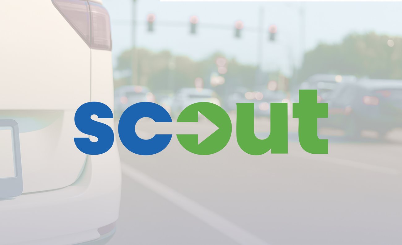 microtransit vehicle in traffic at intersection