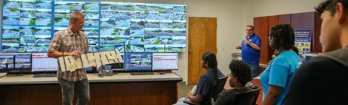 Public Works professionals showcasing their work to CareerSource Students
