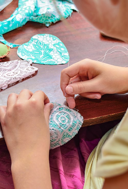Teen sewing