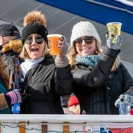 women drinking outside in winter