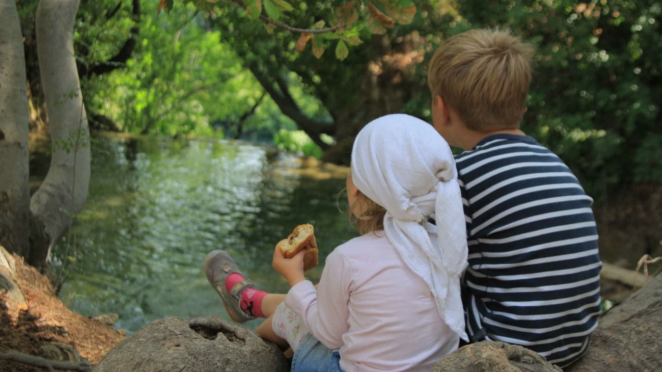 kids next to the water