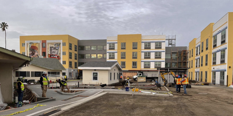 Photo of construction workers on the Depot Road housing complex.