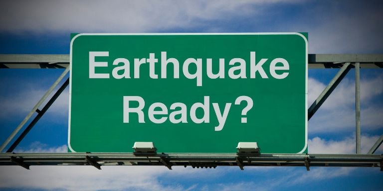 Photo of a street sign that reads Earthquake Ready?