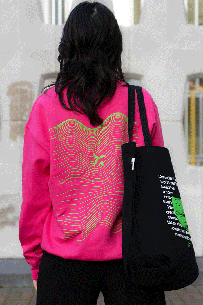 The Breach Associate Producer Katia Lo Innes wearing the Breach sweatshirt in different colours. The Breach Associate Producer Katia Lo Innes wearing the Breach sweatshirt in different colours.