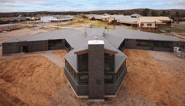 Prison building shaped like a soaring eagle.