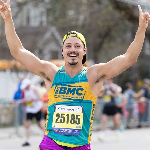 Marathon runner celebrating 