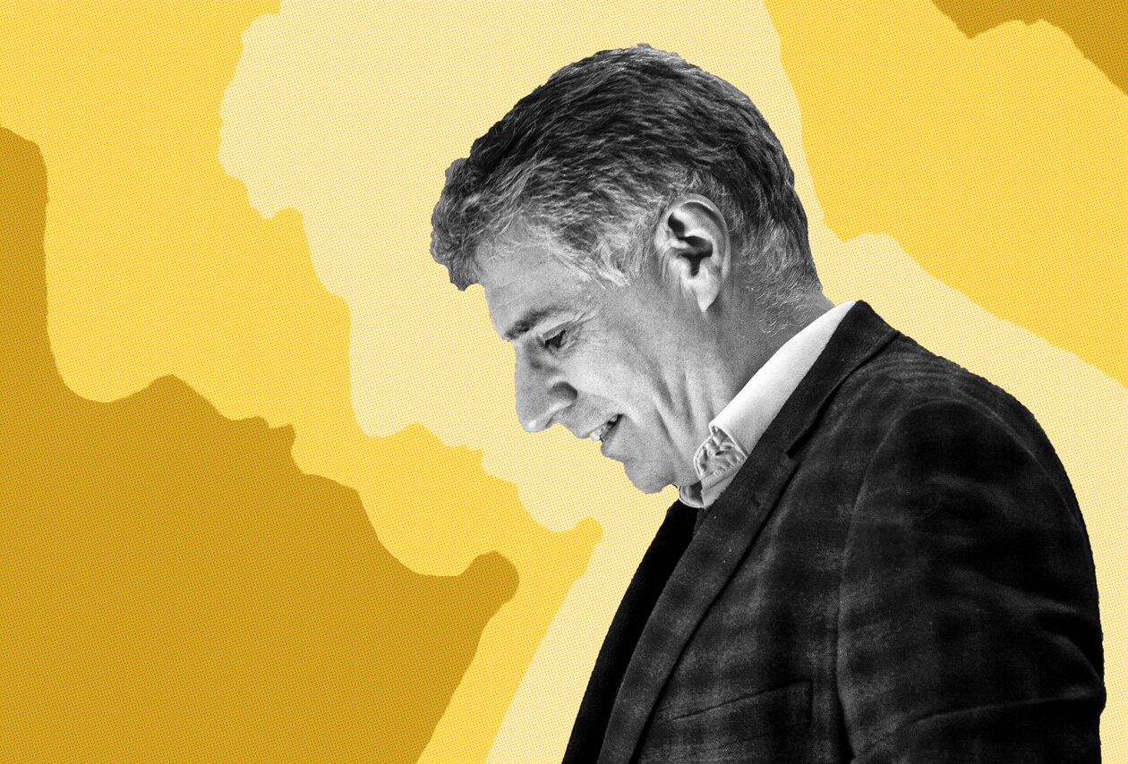 Black-and-white photograph of a man, poet Richard Greene, on a yellow background