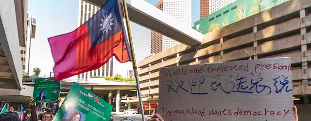 Supporters of Taiwan's president, Tsai Ing-wen, wait for her arrival at Los Angeles, April 4, 2023. AP/Damian Dovarganes