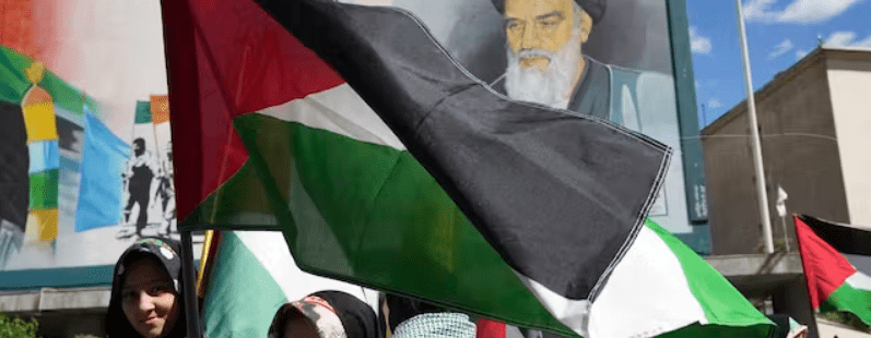 Iranian demonstrators hold Palestinian flags during their annual show of support for the Palestinians, at Tehran, April 14, 2023. AP/Vahid Salemi