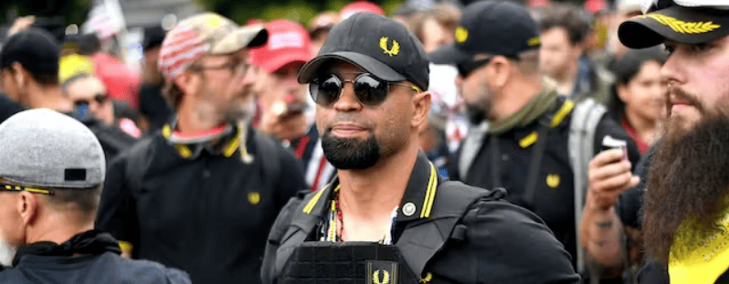 Proud Boys chairman Enrique Tarrio rallies at Portland, Oregon. AP Photo/Noah Berger, File
