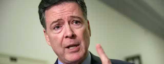 Former FBI Director James Comey speaks to reporters on Capitol Hill in December 2018. AP/J. Scott Applewhite, file
