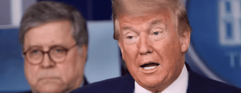 President Trump at the White House flanked by Attorney General Barr on April 1, 2020. Win McNamee/Getty Images
