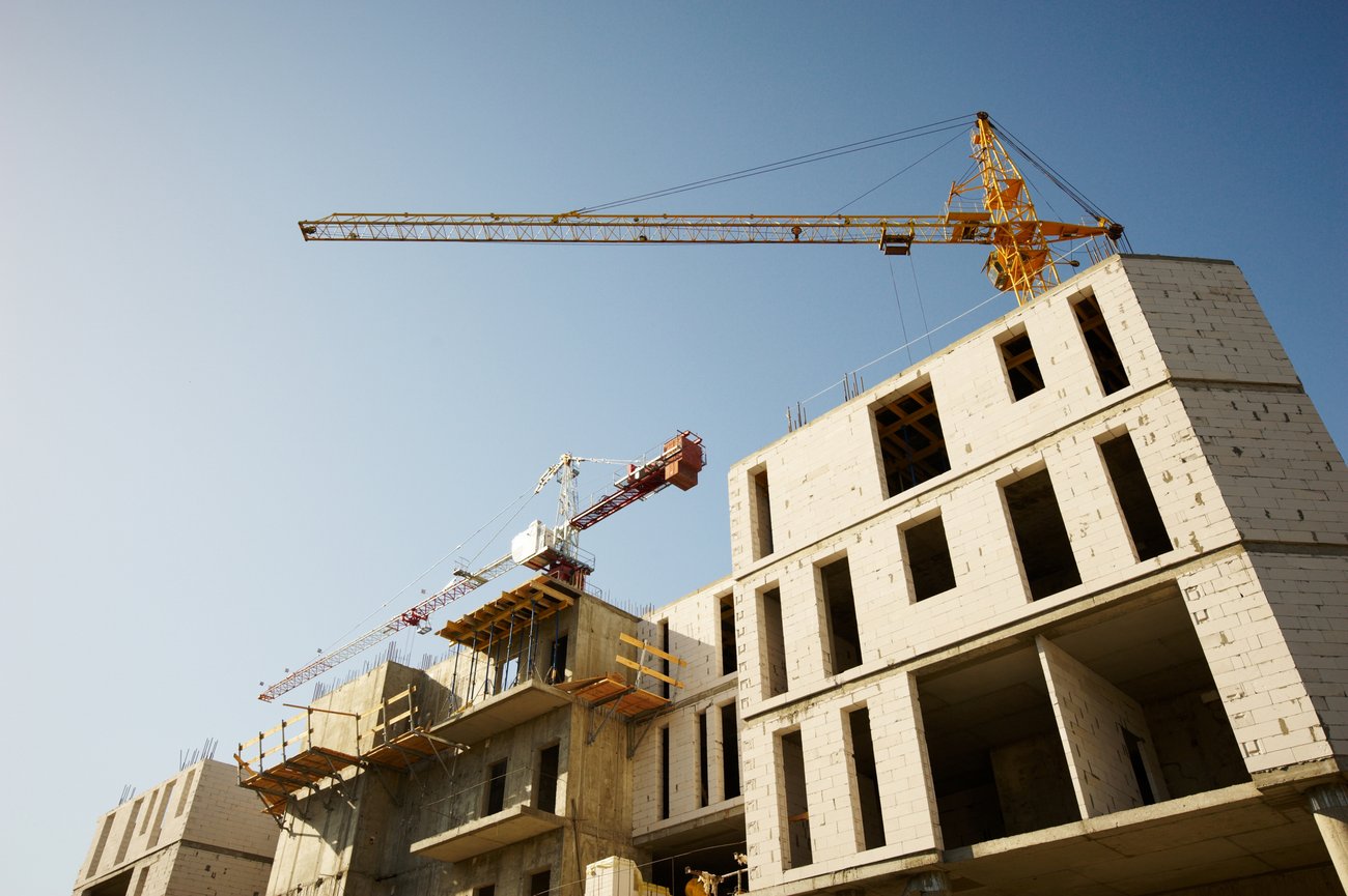 Building under Construction, cranes.