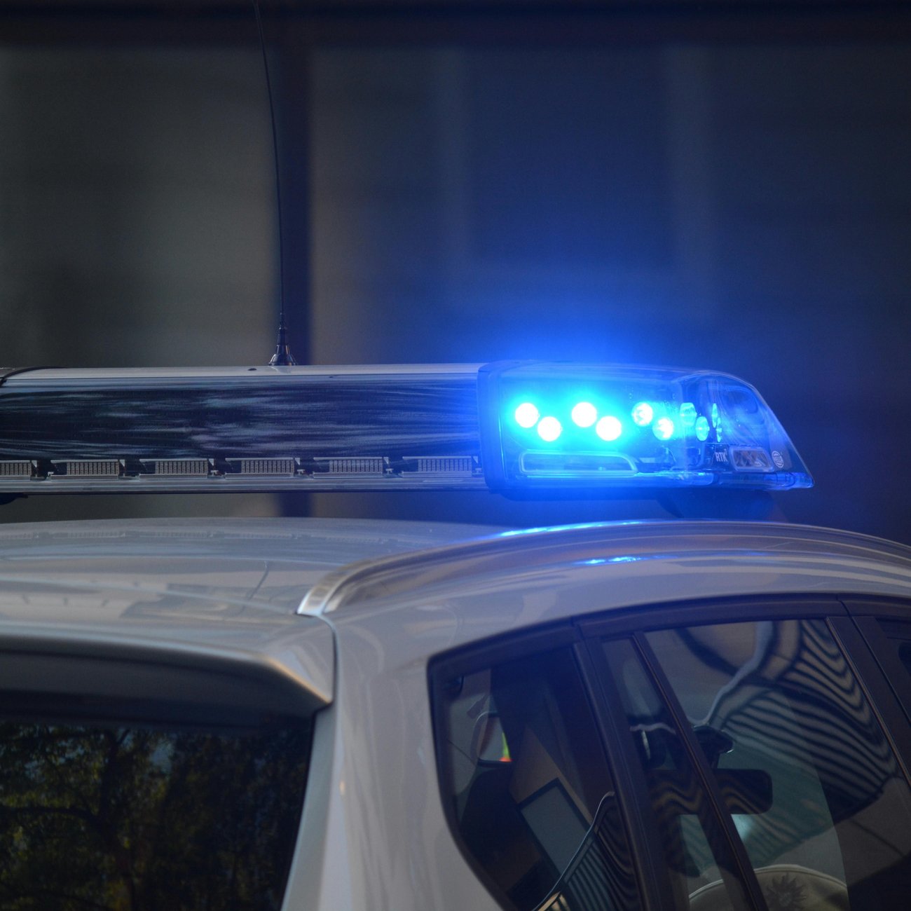 Man sitting with his hands in a prayer position under his chin.