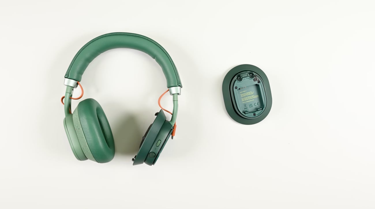 Image: One of the Fairbuds XL Gen 2's case is removed to reveal its easily replaceable battery