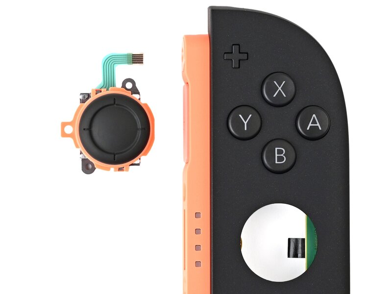 The joystick removed from a right Joy-Con 2