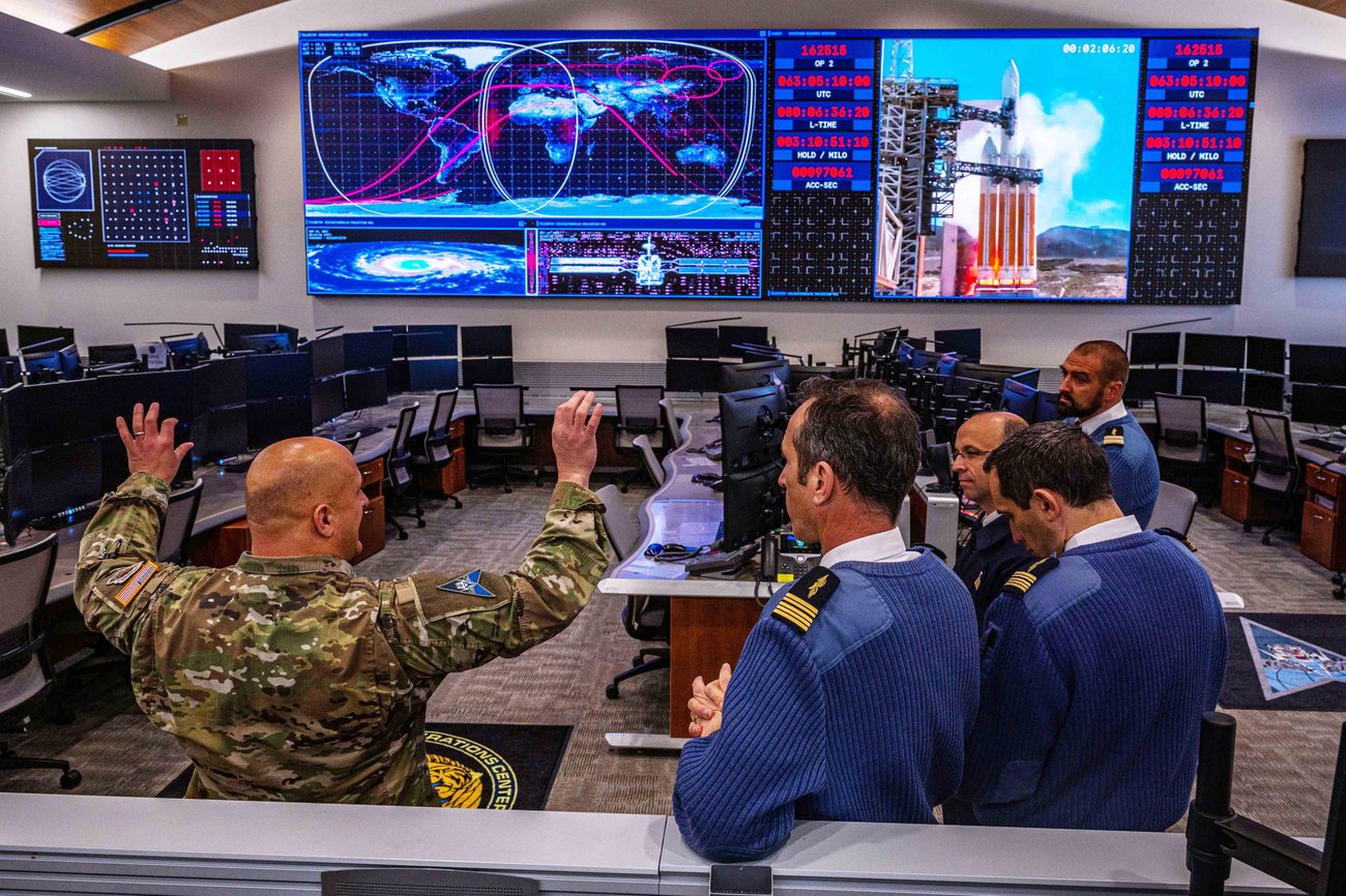 Space Force Col. Phillip Verroco, deputy director of the Combined Space Operations Center, explains the layout of the CSpOC operations floor to members of a delegation of French officers at Vandenberg Space Force Base, Calif., April 15, 2022. Space Force Col. Phillip Verroco, deputy director of the Combined Space Operations Center, explains the layout of the CSpOC operations floor to members of a delegation of French officers at Vandenberg Space Force Base, Calif., April 15, 2022.