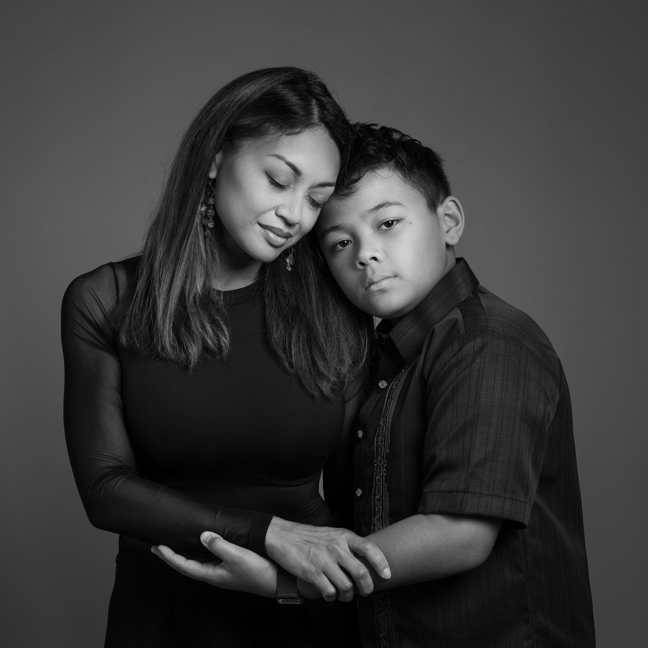 Framed portrait of a couple hanging above a sideboard