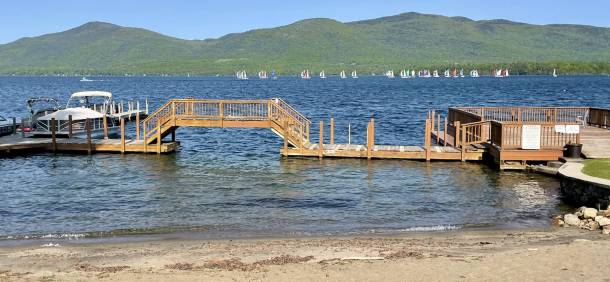 people on lake george beach