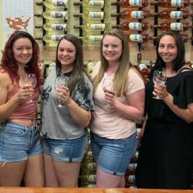 ladies at winery for bachelorette party