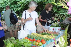 people shopping at farmers markets