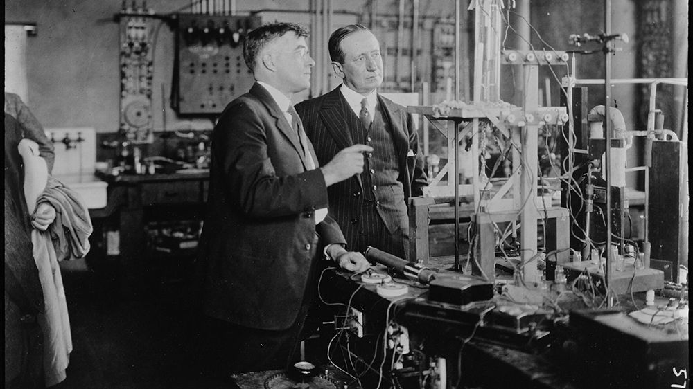 a black and white photo of Irving Langmuir Irving Langmuir also worked with Guglielmo Marconi, inventor of the wireless telegraph system, at the General Electric Research Laboratory. 