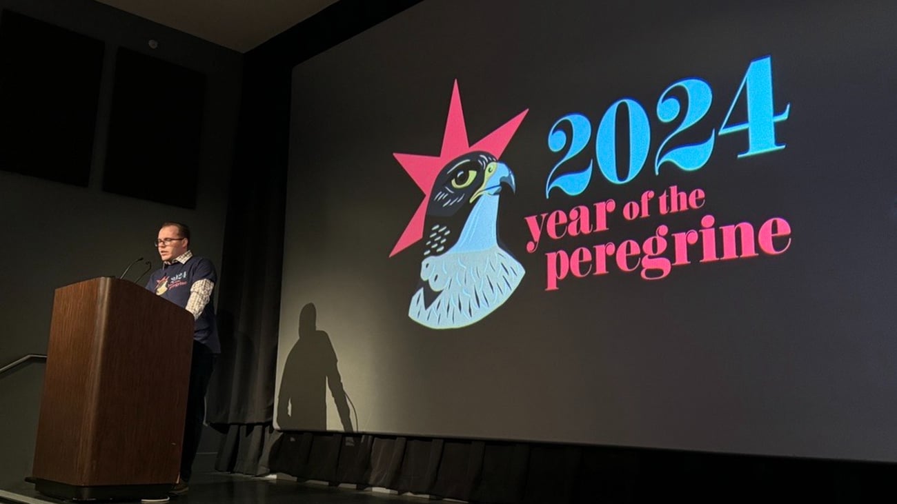 Caption: Edward Warden, president of Chicago Ornithological Society, introduces the final Year of the Peregrine program. Credit: Patty Wetli / WTTW News