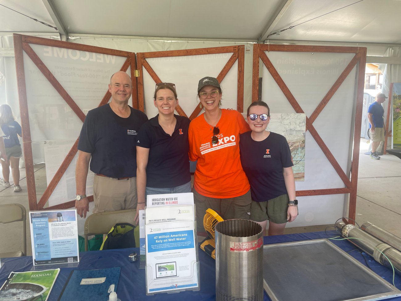 Private Well Class Program Director Steve Wilson, Illinois State Water Survey Director Jenna Shelton, and Private Well Class staff Erin Huggett & Katelyn McLaughlin pictured working at the 2025 Illinois State Fair in Springfield, Illinois. Private Well Class Program Director Steve Wilson, Illinois State Water Survey Director Jenna Shelton, and Private Well Class staff Erin Huggett & Katelyn McLaughlin pictured working at the 2025 Illinois State Fair in Springfield, Illinois.