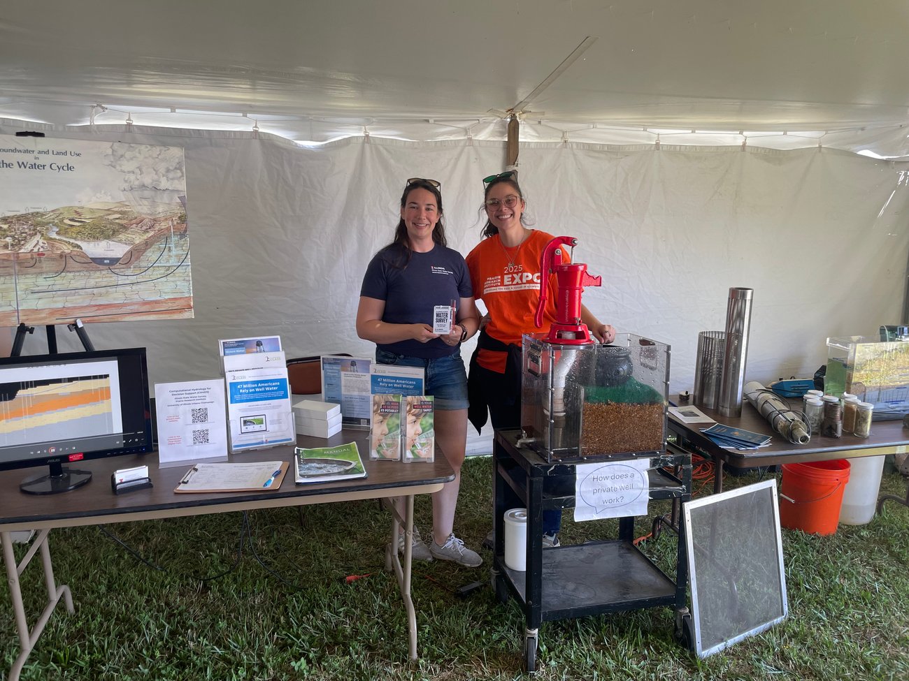 Private Well Class Outreach Director Katie Buckley and staff member Erin Huggett picture working at the 2025 Farm Progress Show in Decatur, Illinois. Private Well Class Outreach Director Katie Buckley and staff member Erin Huggett picture working at the 2025 Farm Progress Show in Decatur, Illinois.