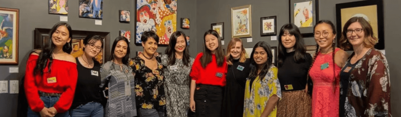 Winged Canvas team in former studio gallery