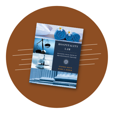 Hospitality Law 5th Edition Cover against a rust brown circular
background