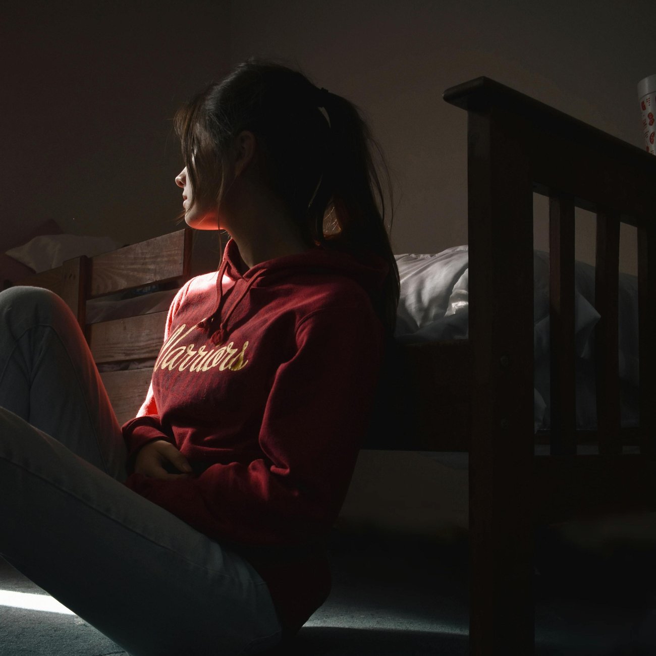 Woman looking towards a window