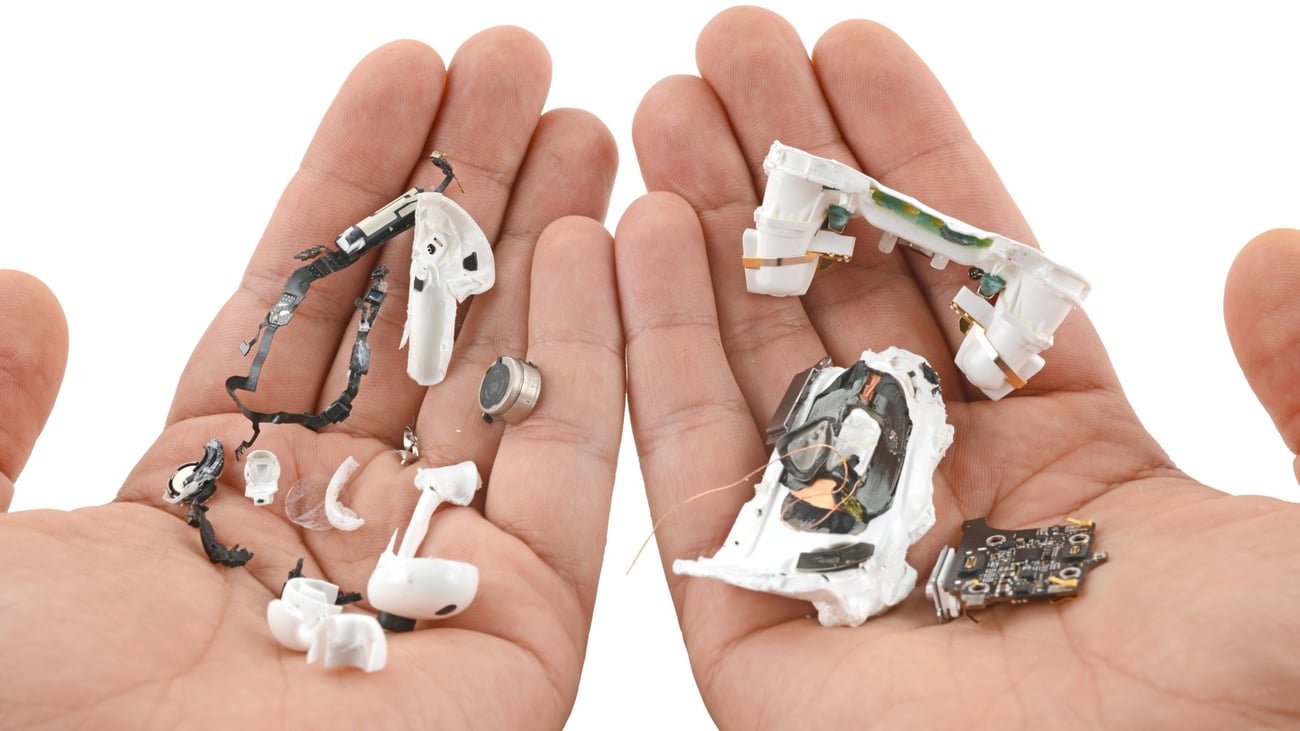A disassembled pair of Airpods 3 Pro