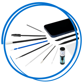 A set of precision cleaning tools, including brushes, swabs, and a small spray bottle, arranged next to a smartphone on a neutral background with a blue circular frame.