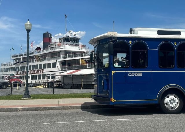 trolley in front of lake george steamboat co