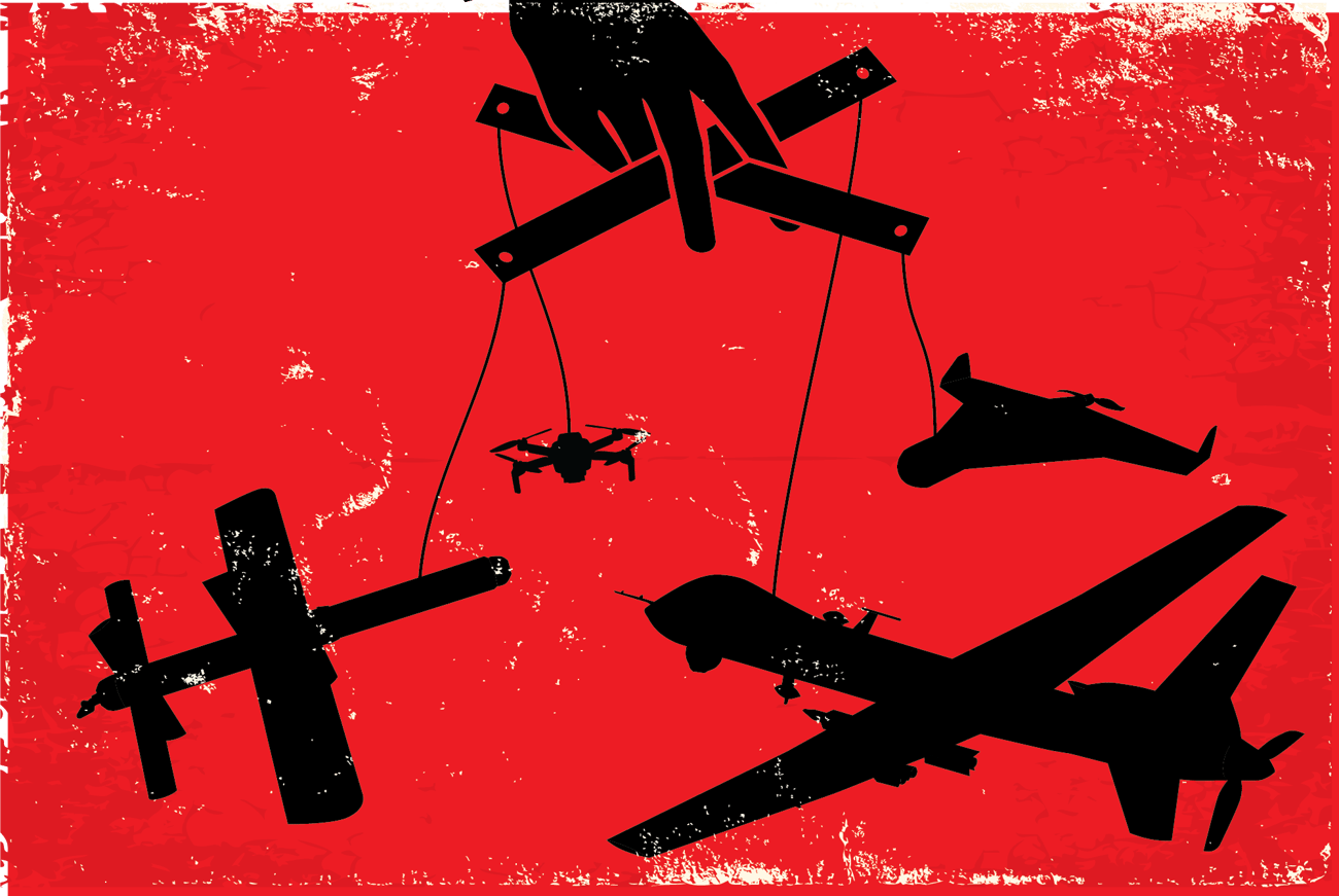 Black-on-red illustration showing a hand manipulating drones like a marionette puppet.