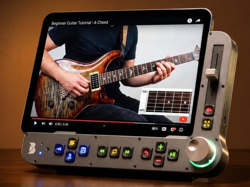 Benjamin control surface holding an iPad showing a guitar lesson.