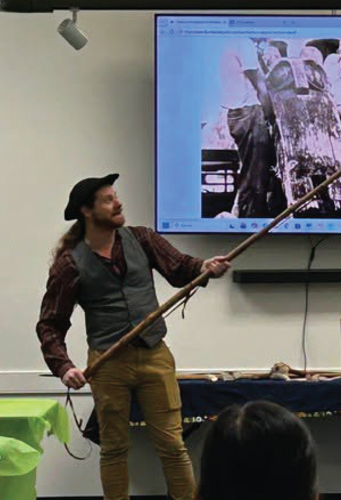 staff presenting history at library