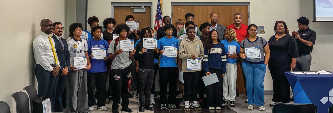 Careersource students with county officials holding certificates Careersource students with county officials holding certificates
