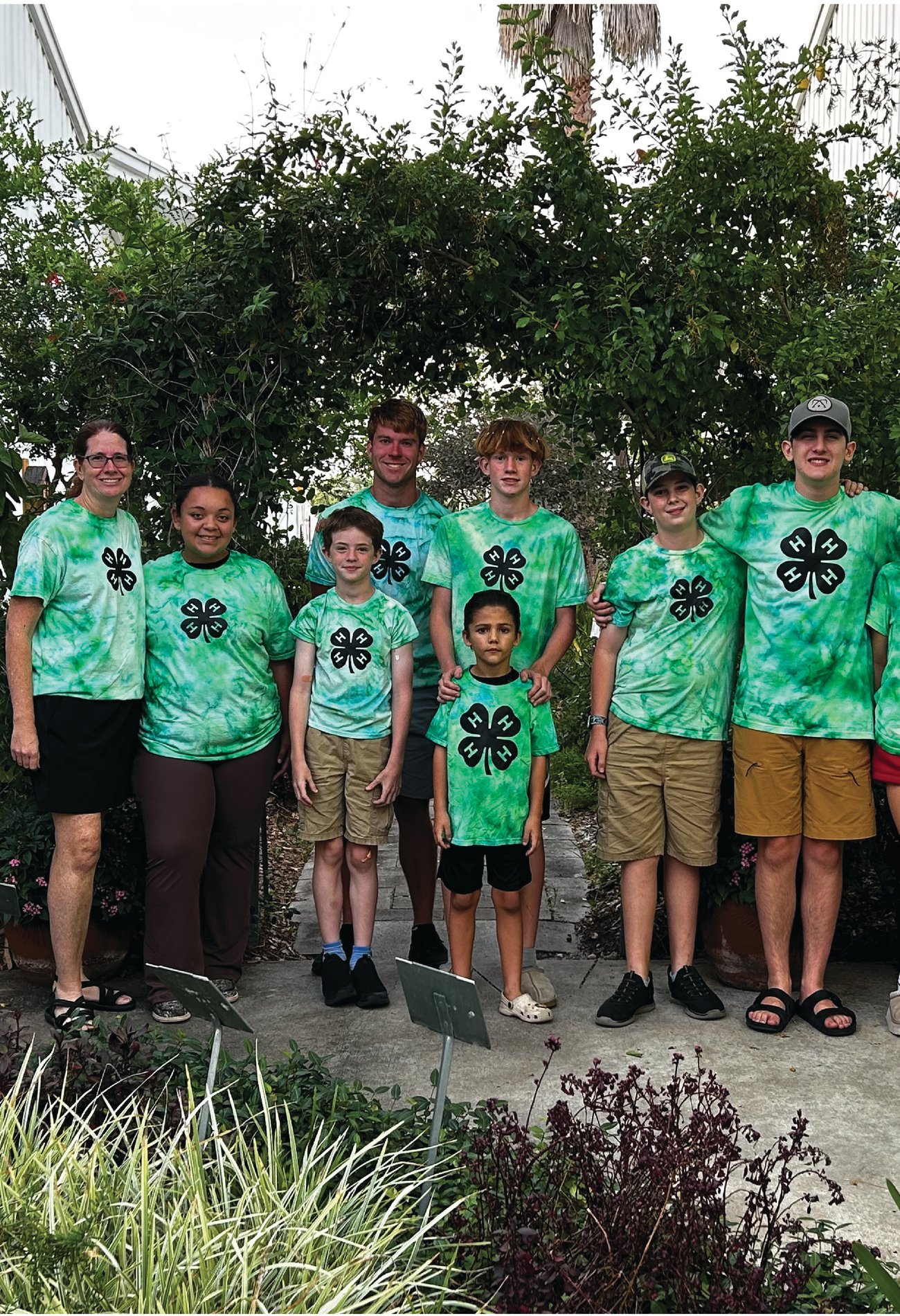 4H students standing in front of Garden