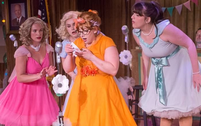 four actors on stage