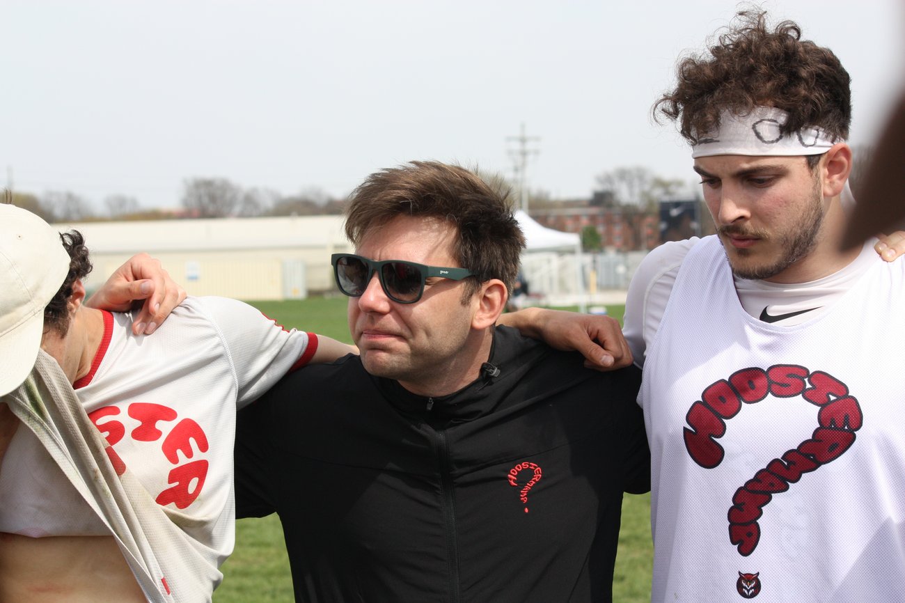 Coach Jon in an end-of-season huddle with the team after regionals 2026. Coach Jon in an end-of-season huddle with the team after regionals 2026.