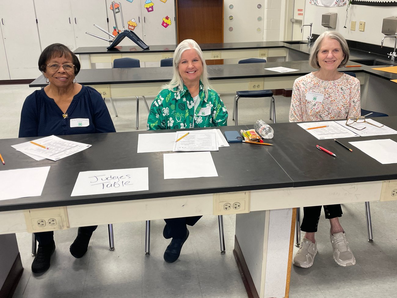 3 smiling lady judges