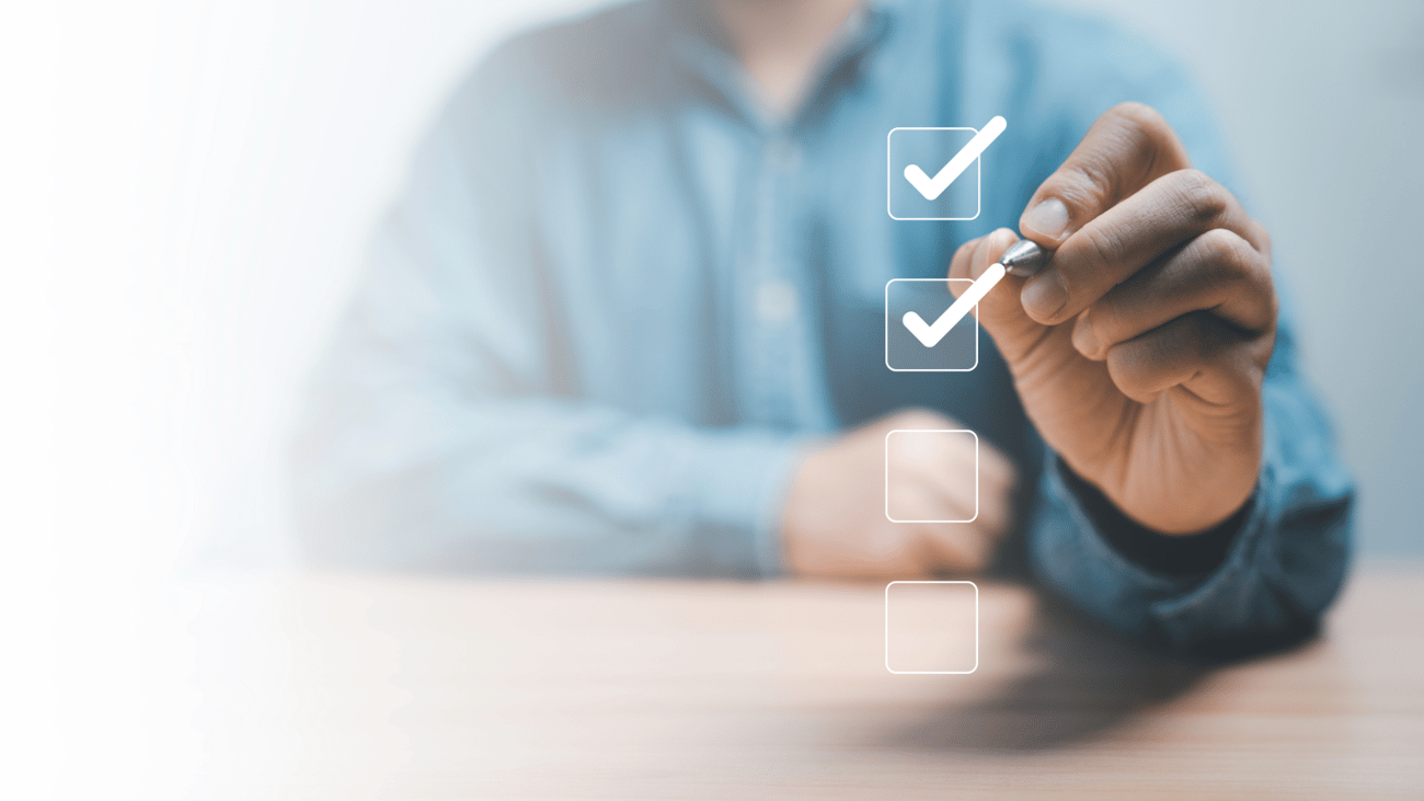 Header image of a person checking off boxes of a checklist