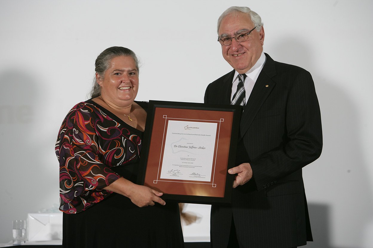  Dr Christine Jeffries-Stokes receiving the Outstanding Service to Rural and Remote Health Award presented by Dr Ken Michael AC Governor of Western Australia.