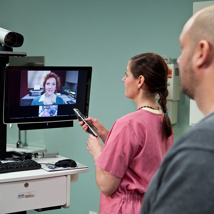 A doctor having a telehealth appointment with a patient
