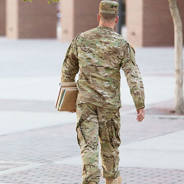 Man in U.S. military uniform walking